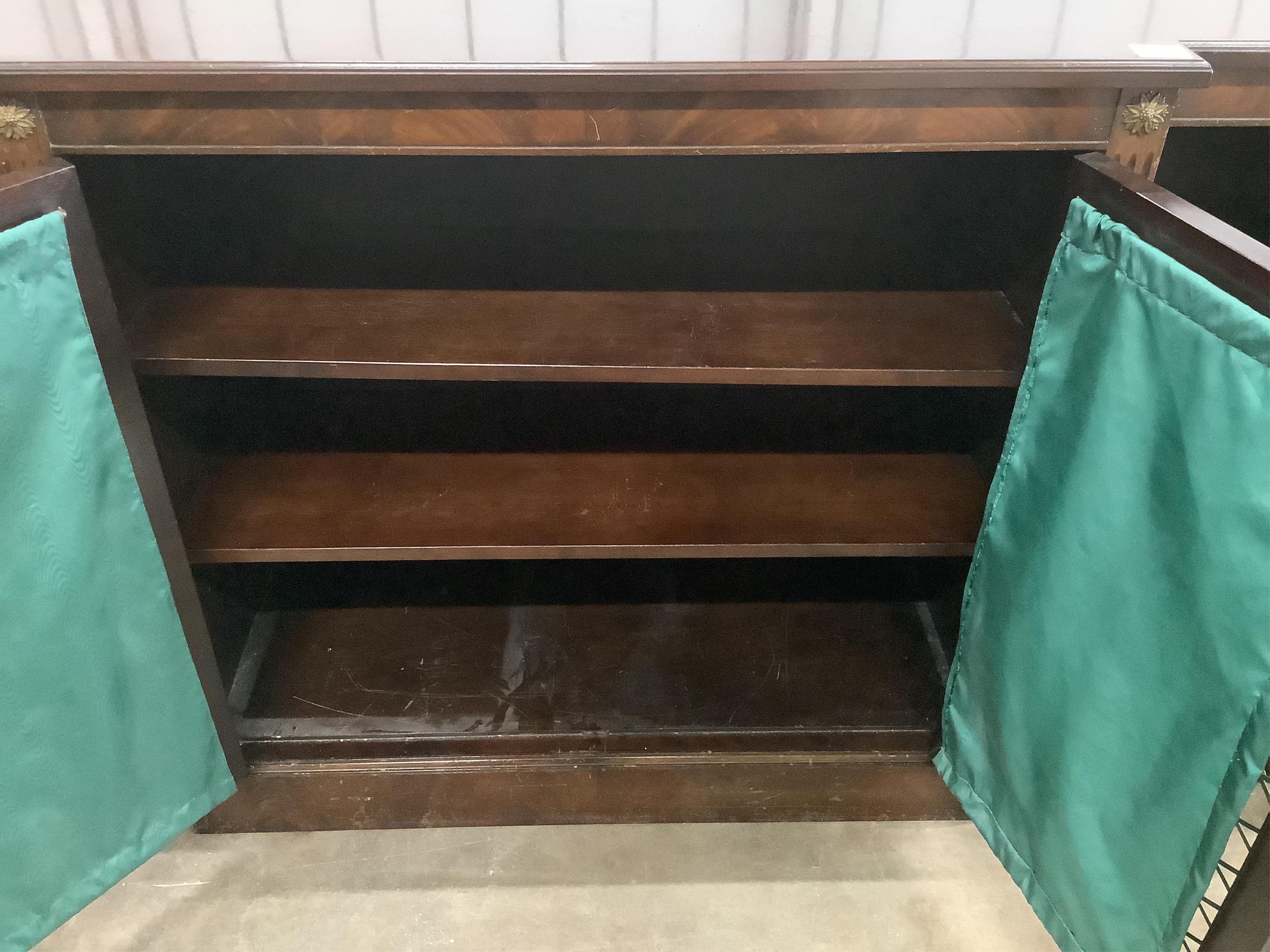 An Edwardian mahogany breakfront dwarf bookcase, width 178cm, height 92cm. Condition - poor